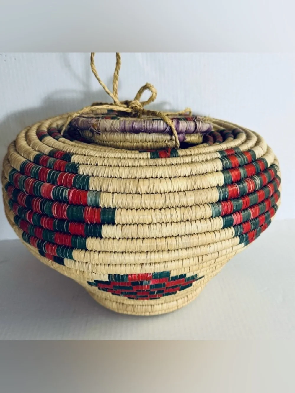 Vintage Handwoven Natural Grass Storage Basket with Red & Green Accents